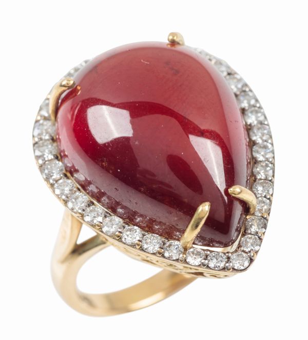 A GARNET AND DIAMOND DRESS RING