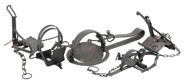 A LARGE 19TH CENTURY WROUGHT IRON GIN TRAP