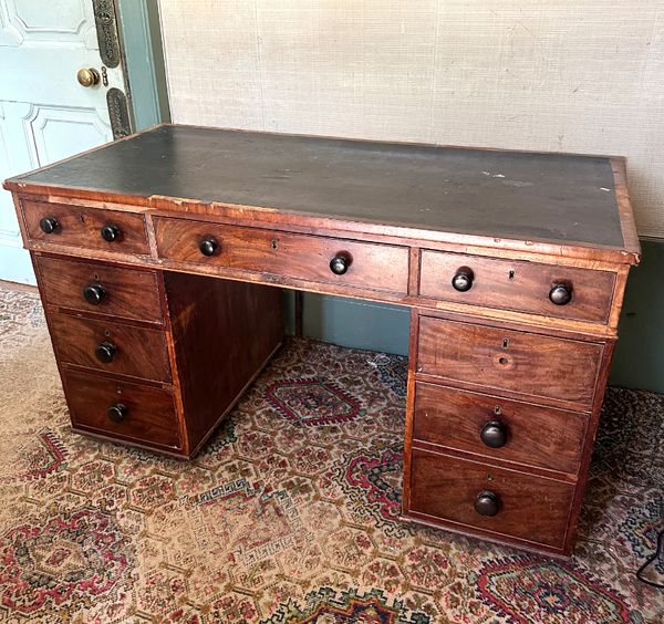 A MAHOGANY PEDESTAL DESK