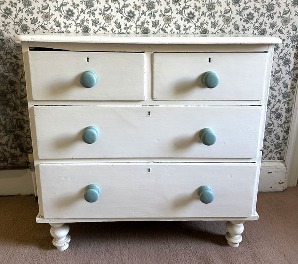 A VICTORIAN WHITE-PAINTED PINE CHEST OF DRAWERS