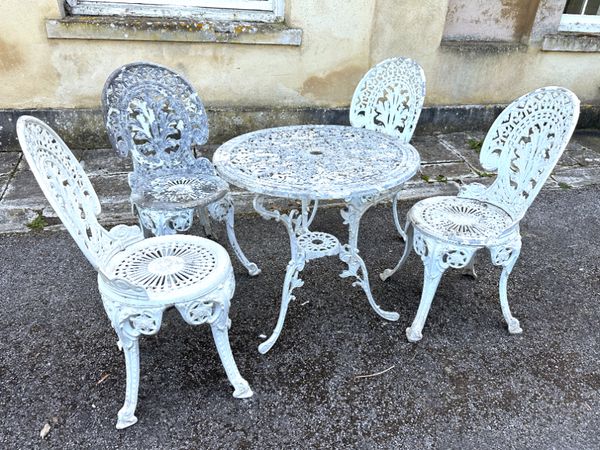A COALBROOKDALE STYLE CAST-METAL GARDEN SUITE