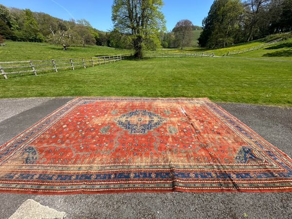 A LARGE PERSIAN COUNTRY HOUSE CARPET
