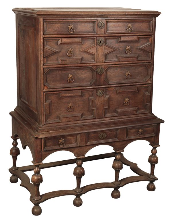 AN ENGLISH OAK CHEST ON STAND