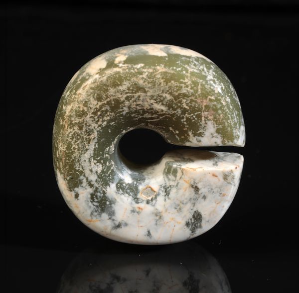 A CHINESE JADE SLIT RING