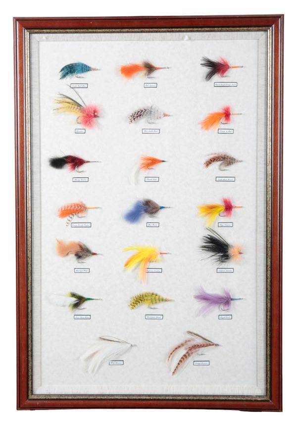 A FRAMED DISPLAY OF TWENTY TARPON FLIES