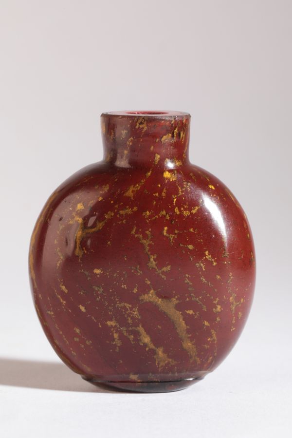 A CHINESE RED AVENTURINE GLASS SNUFF BOTTLE