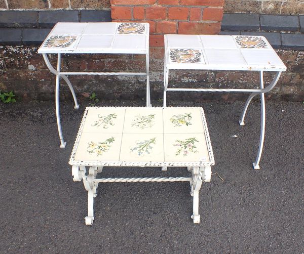 A PAIR OF IRON CURVED 'X' FRAME GARDEN TABLES