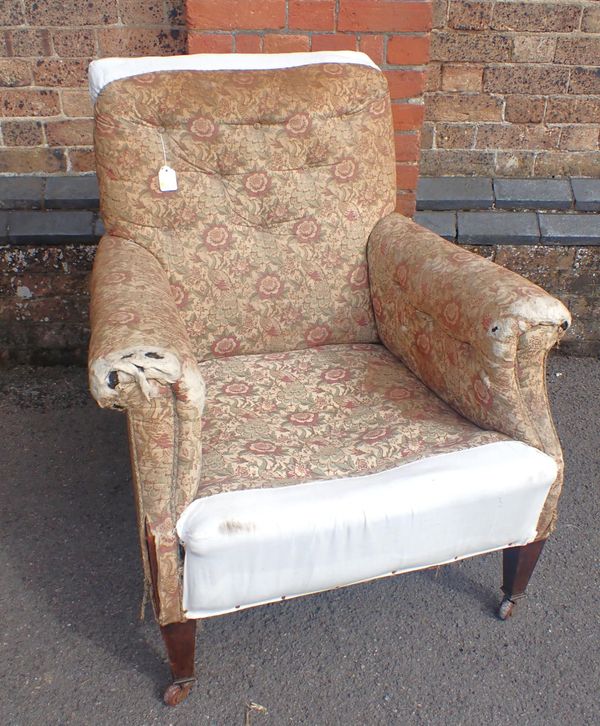 A LATE 19th CENTURY ARMCHAIR IN THE STYLE OF HOWARD & SONS