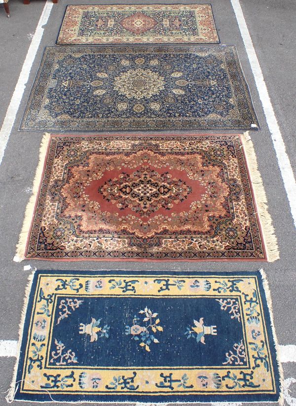 A 1930s CHINESE BLUE AND YELLOW RUG