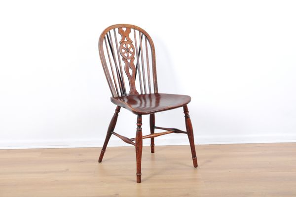 AN ELM AND BEECH WINDSOR WHEEL AND STICK-BACK CHAIR