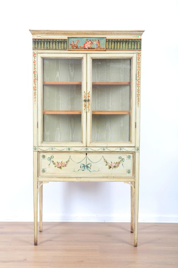AN EDWARDIAN POLYCHROME PAINTED DISPLAY CABINET