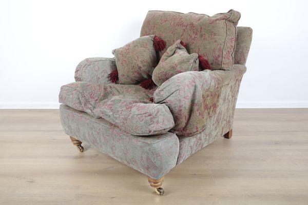 A HOWARD STYLE ‘COUNTRY HOUSE’ ARMCHAIR