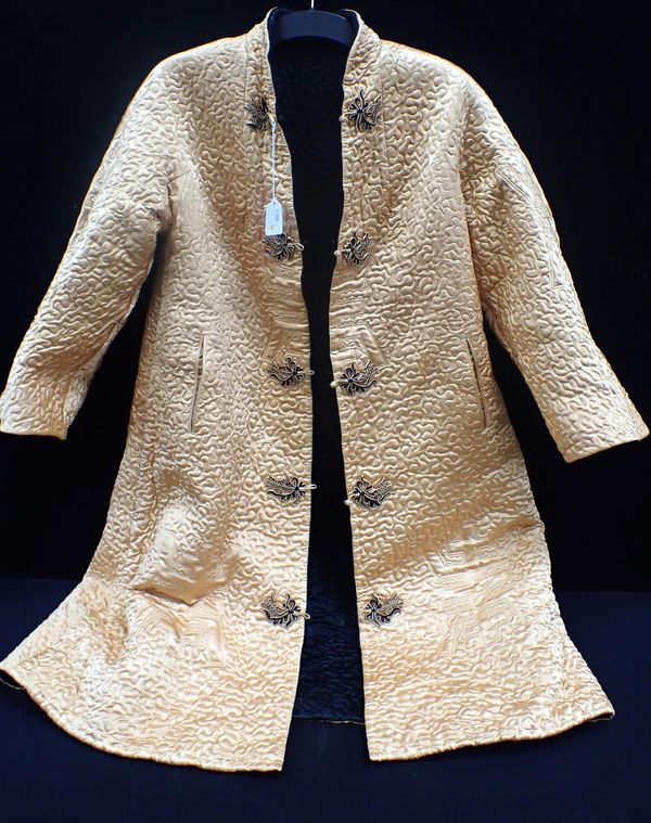 A CHINESE QUILTED SILK REVERSIBLE COAT