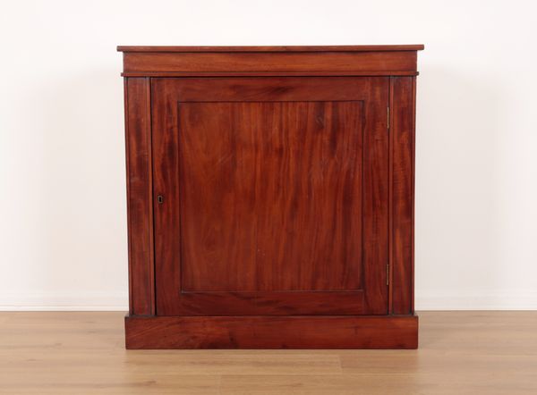 A FIGURED MAHOGANY PIER CABINET