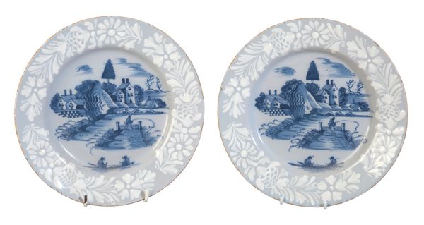 A PAIR OF DELFT LILAC GLAZED PLATES