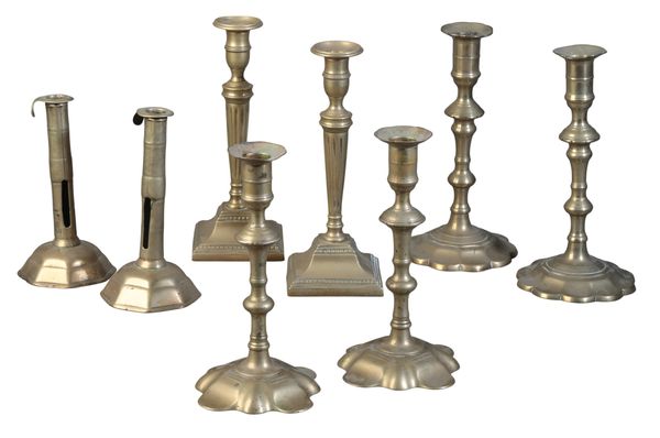 A PAIR OF BRASS CANDLESTICKS