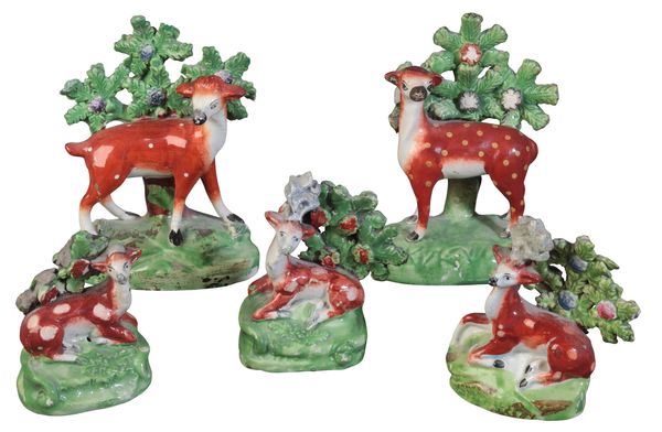 A GROUP OF FIVE STAFFORDSHIRE PEARLWARE DEER