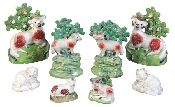 A COLLECTION OF EIGHT STAFFORDSHIRE PEARLWARE SHEEP