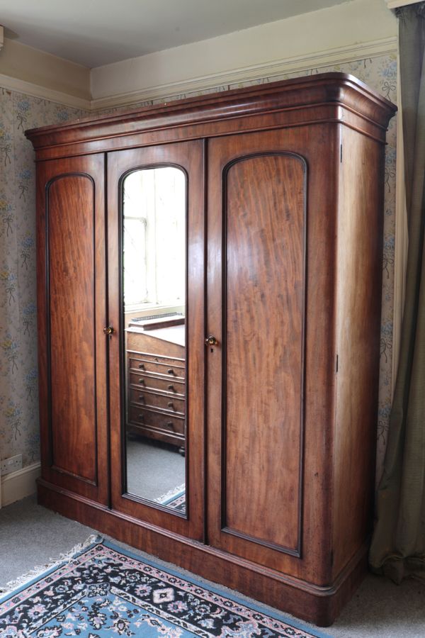 A VICTORIAN MAHOGANY TRIPLE WARDROBE