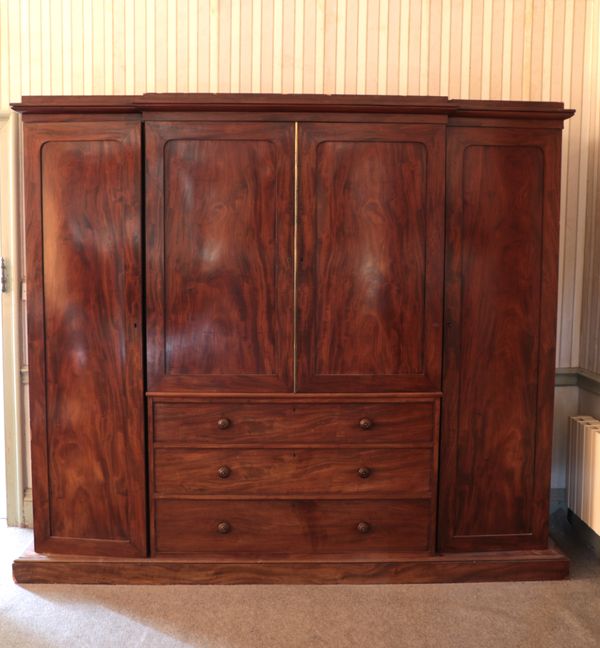 A VICTORIAN MAHOGANY BREAKFRONT WARDROBE