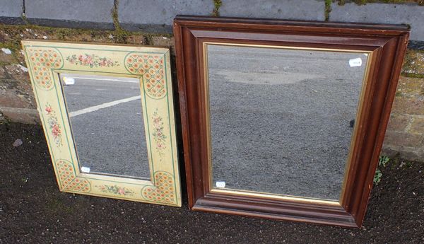 A WALL MIRROR WITH DECORATIVE PAINTED FRAME