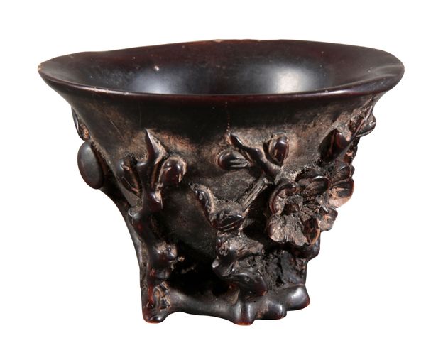 A CHINESE CARVED LIBATION CUP