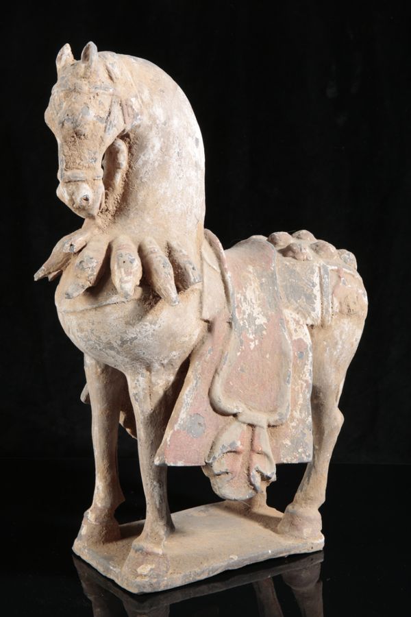 A CHINESE POTTERY HORSE