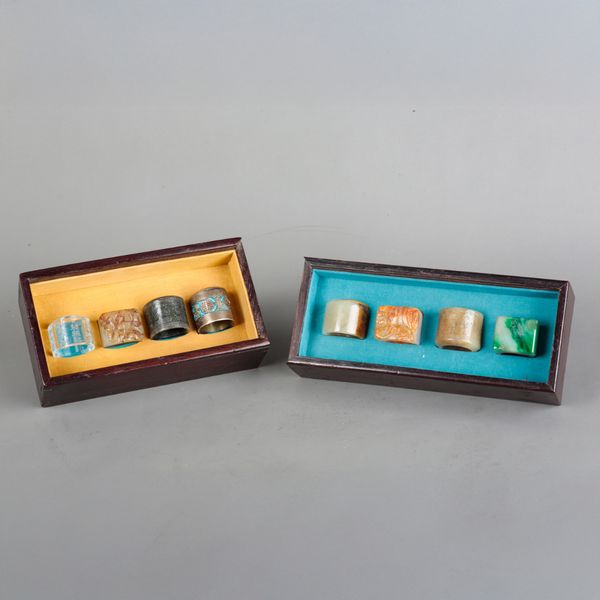 A COLLECTION OF EIGHT CHINESE ARCHER'S RINGS