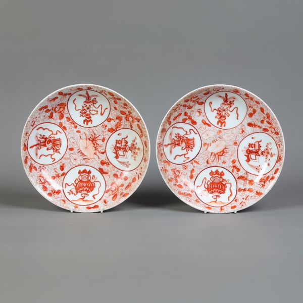 A PAIR OF CHINESE RED GLAZED PLATES