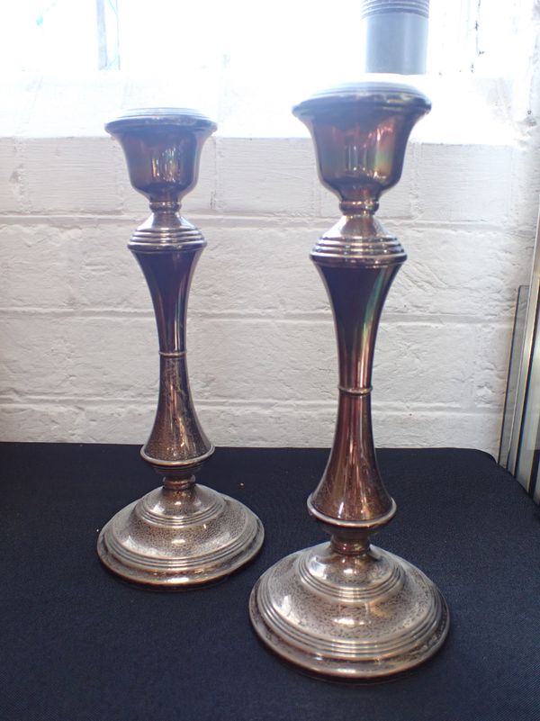 A PAIR OF ELIZABETH II SILVER CANDLESTICKS