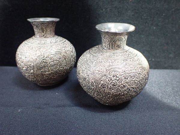 A PAIR OF PERSIAN WHITE METAL SQUAT BULBOUS VASES