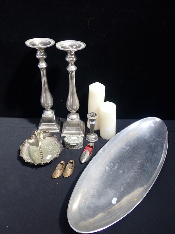 A PAIR OF WHITE METAL CANDLESTICKS AND 'CANOE SHAPED' SHALLOW TRAY