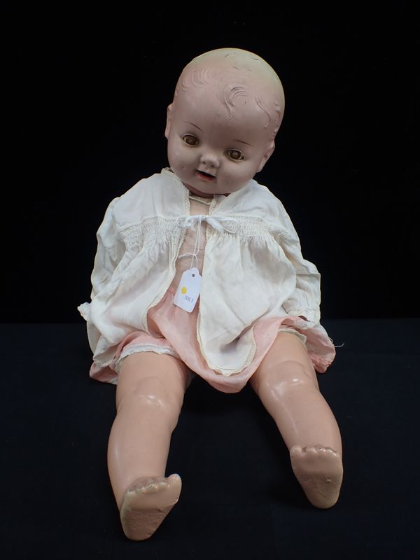 A 1930s 'PETITE' DOLL, WITH COPOSITION HEAD AND LIMBS