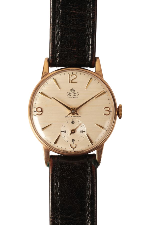 SMITHS DELUXE: A GENTLEMAN'S 9CT GOLD WRISTWATCH