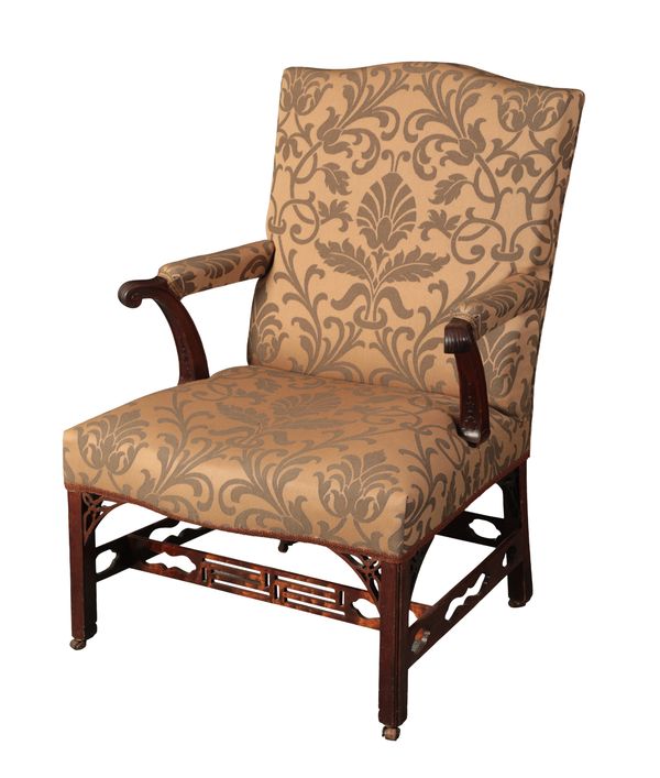 A GEORGE III MAHOGANY GAINSBOROUGH ARMCHAIR