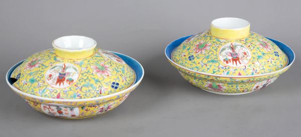 A PAIR OF CHINESE PORCELAIN FAMILLE ROSE BOWLS AND COVERS
