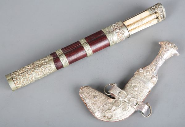 A SOUTH EAST ASIAN WHITE METAL MOUNTED TROUSSE SET