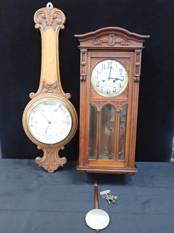 A 1920s WALNUT CASED WALL CLOCK