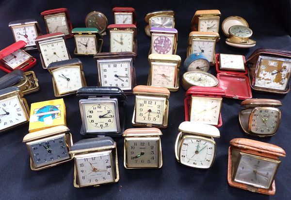 A QUANTITY OF VARIOUS VINTAGE TRAVEL CLOCKS