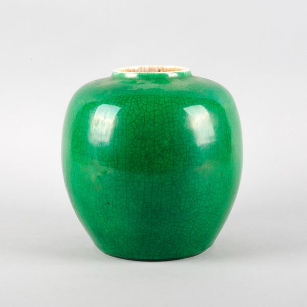 A CHINESE PORCELAIN APPLE GREEN CRACKLE GLAZED JAR