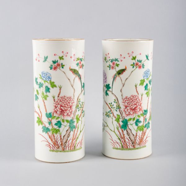 A PAIR OF CHINESE PORCELAIN FAMILLE ROSE CYLINDER VASES OR HAT STANDS