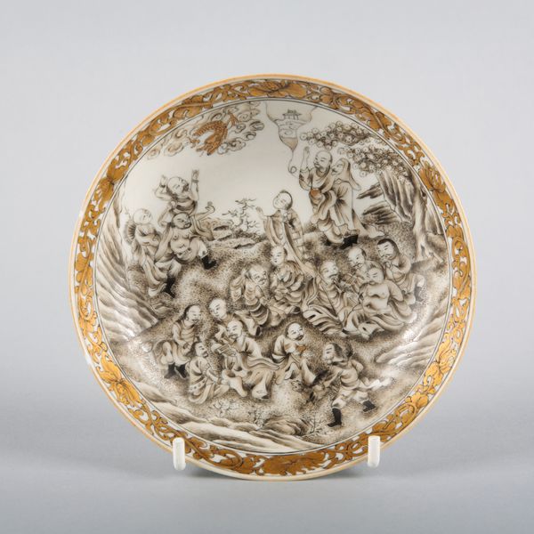 A CHINESE EXPORT PORCELAIN SAUCER
