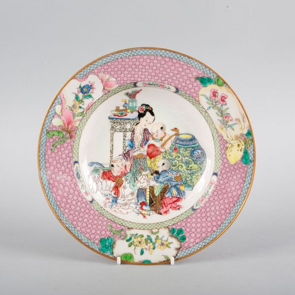 A CHINESE PORCELAIN FAMILLE ROSE 'LADY AND BOYS' DISH