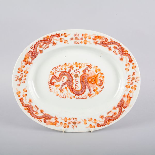 A CHINESE PORCELAIN IRON RED AND GILT 'DRAGON' SERVING PLATTER