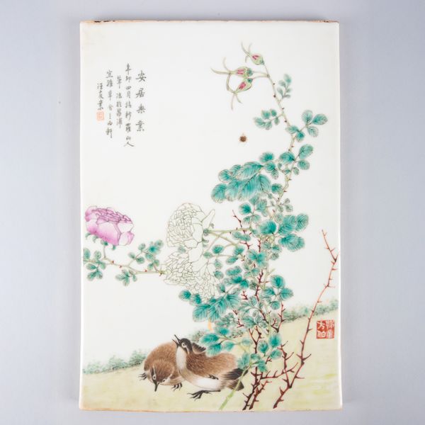 A CHINESE PORCELAIN FAMILLE ROSE PLAQUE