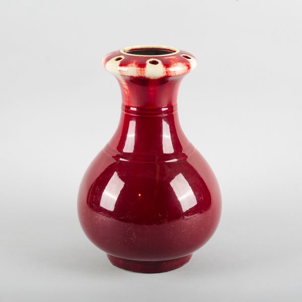 A CHINESE PORCELAIN OX BLOOD GLAZED FLOWER VASE