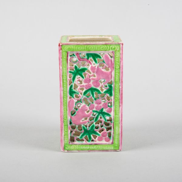 A CHINESE PORCELAIN FAMILLE ROSE RETICULATED BRUSH POT