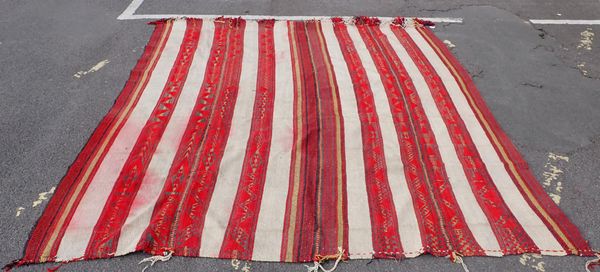 AN EGYPTIAN TRIBAL BEDOU STYLE STRIPED RUG