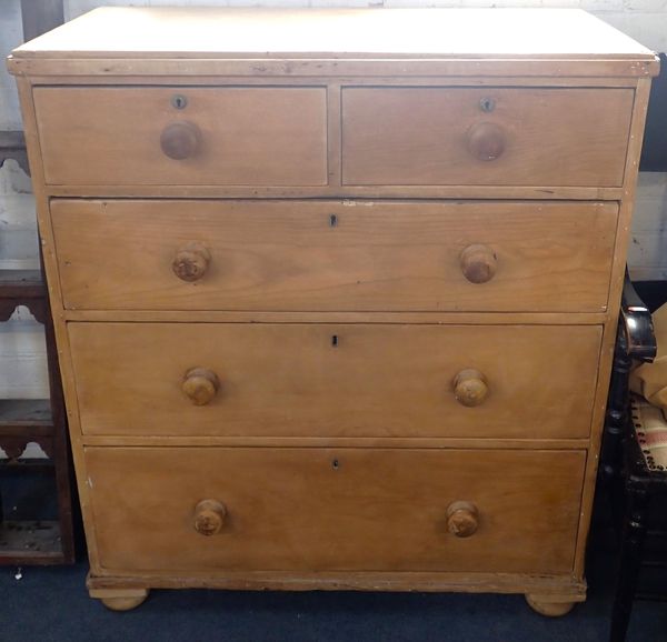 A 19th CENTURY STRIPPED PINE CHEST OF DRAWERS