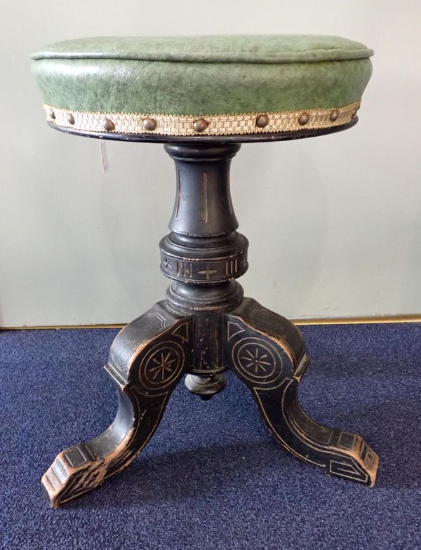 A VICTORIAN REVOLVING PIANO STOOL, STAMPED 'W. BROS.'